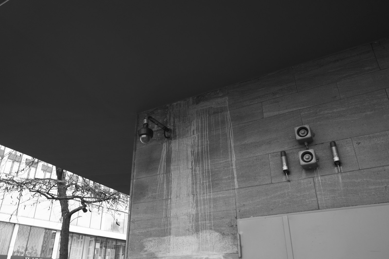 Surveillance cameras on an industrial building